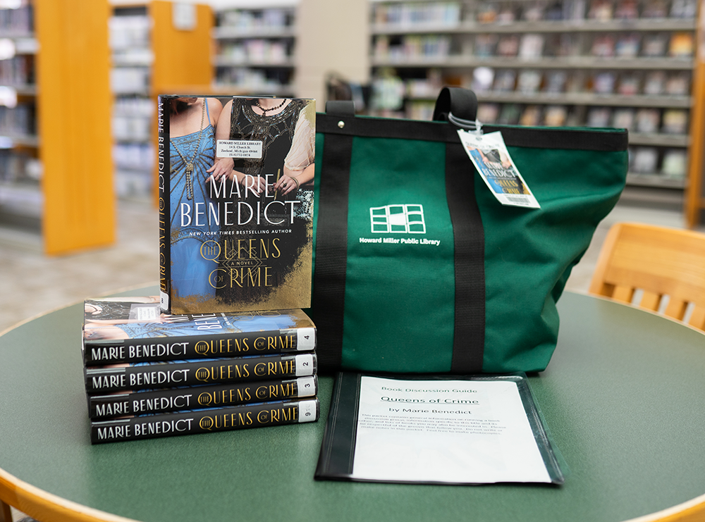 Book Club kits image showing multiple copies of one book sitting beside a library tote