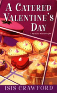 "A Catered Valentine's Day" showing a raised cake plate in the background which holds a one layer, pink cake and another raised cake plate in the forefront which holds multiple small heart-shaped cakes in red and yellow. 