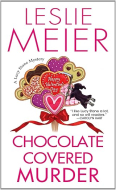 "Chocolate Covered Murder" book cover with a bunch of heart shaped candies tied up in a red bow.  