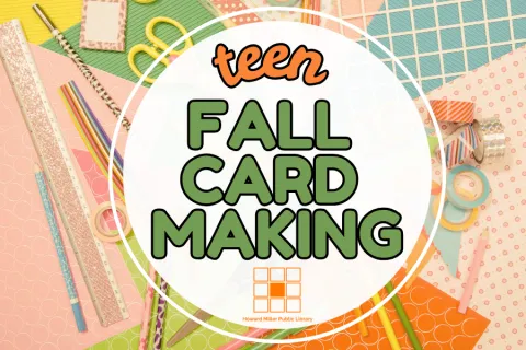 Various pastel papers in the background with rulers, scissors, ribbon and other craft materials on top of the paper
